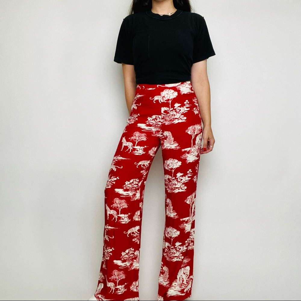 Reformation red and white tiger print high waisted pants.